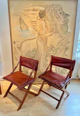 Jacques Adnet documented hand stitched leather pair of chairs