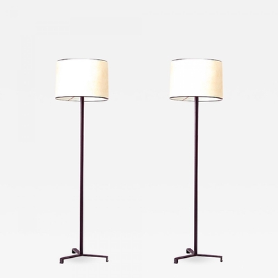 Jacques Adnet pair of tripod black hand leather standing lamps